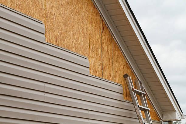 Professional Siding technician working in Titusville, PA